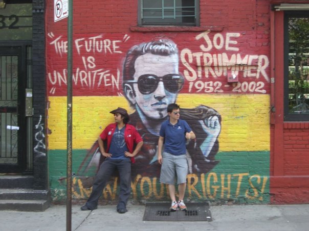 Me and my friend Brian at the Tompkins Square mural of Joe Strummer, circa 2008.