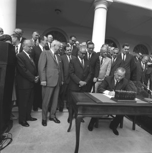 Signing of bill establishing the Department of Housing and Urban Development (HUD), 1965. [LBJ Library, photo by Donald Stoderl]