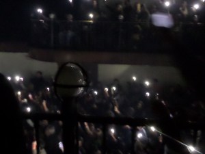 Big Data fans shine a light on the stage. Photo by Janos Marton.