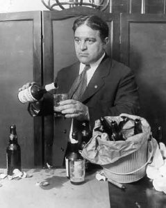 La Guardia pouring beer in office during Prohibition. (LaGuardia Wagner Archives.)